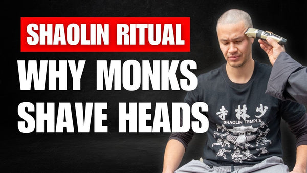 Shi Heng Chuang and Venerable Shi Yan Fan discussing why Shaolin monks shave their heads