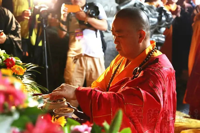 Shi Yongxin, then abbot of the Shaolin Temple, performing a ceremony in ceremonial robes